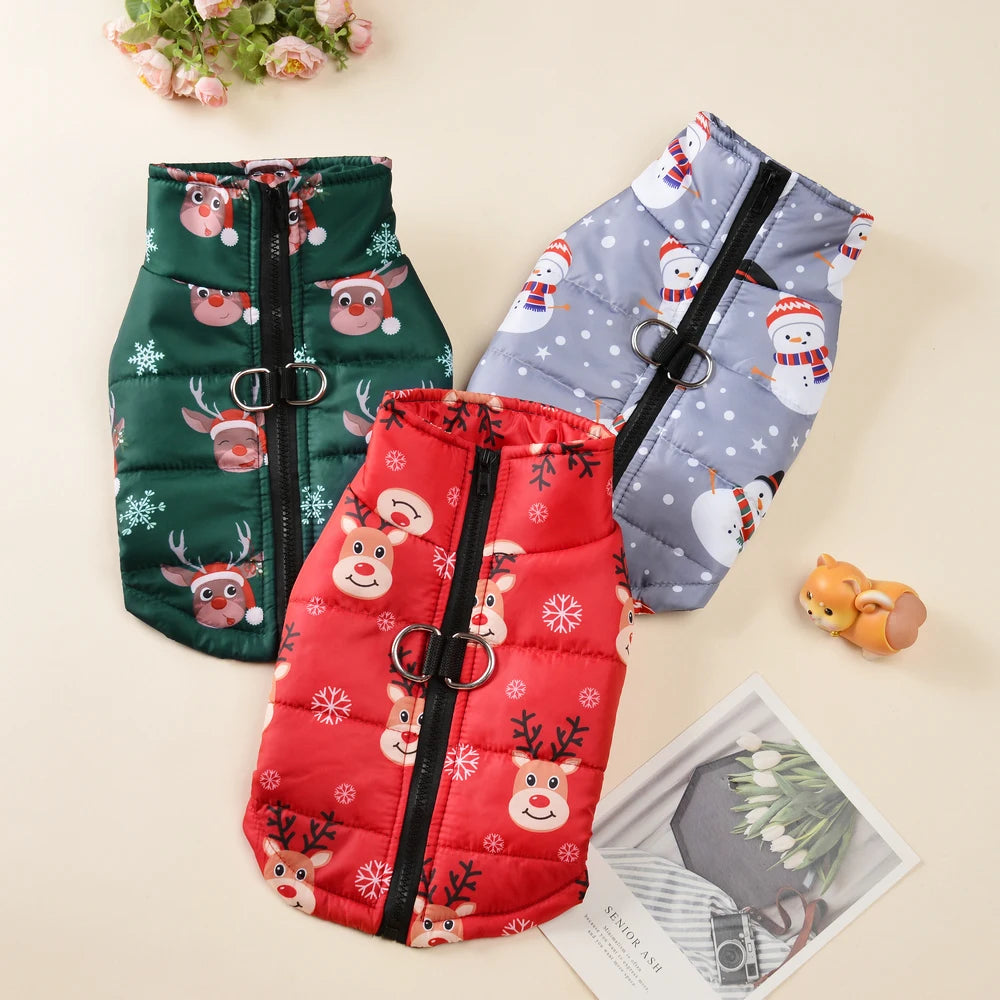 Three dog vests with Christmas patterns on a light background