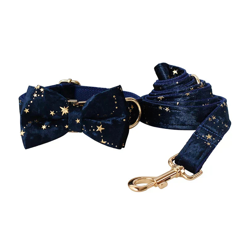 Blue velvet personalized dog collar and lead set with starry pattern and detachable bow tie.