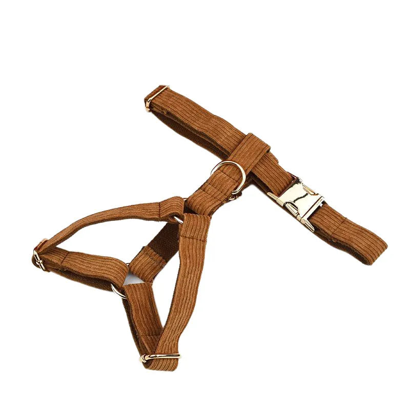 Caramel corduroy dog collar with adjustable straps and metal hardware, offering luxury and comfort.