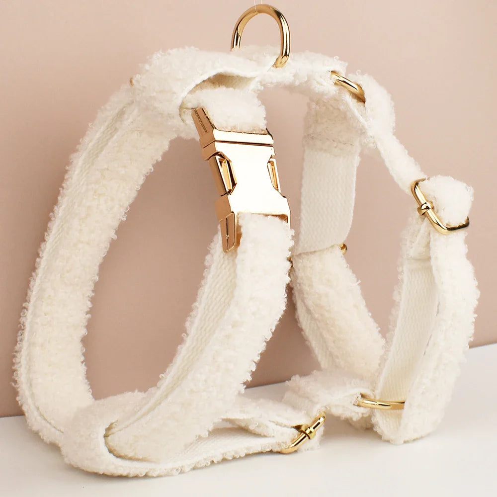 Elegant white teddy fabric dog harness with gold-tone hardware, designed for wedding celebrations.