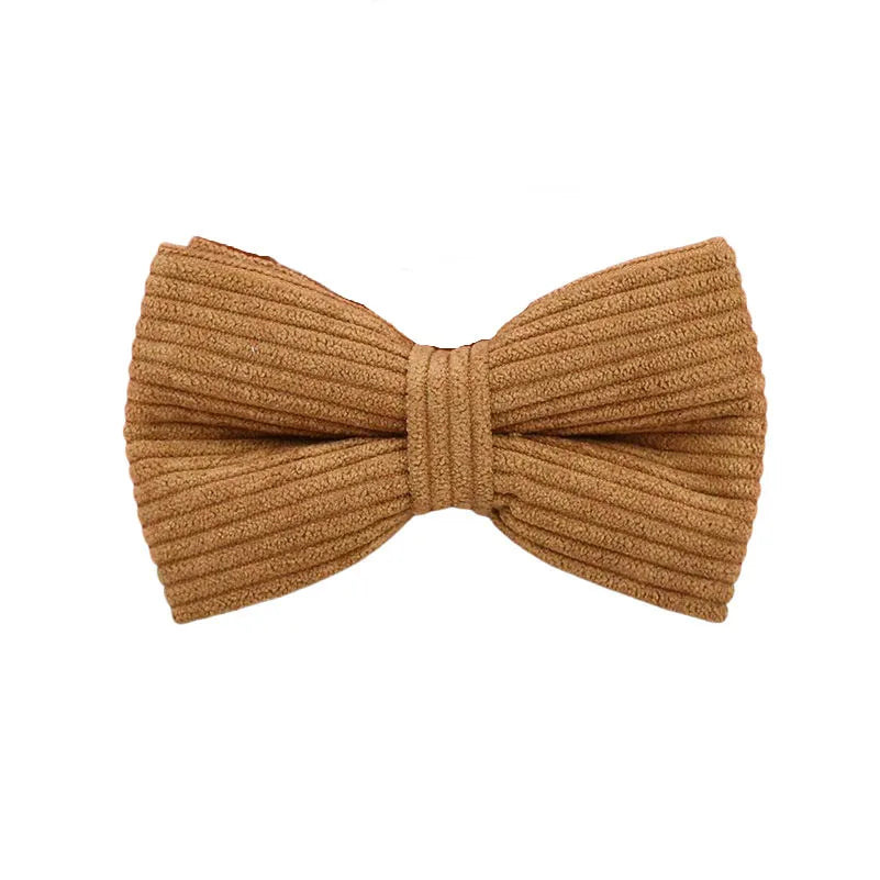 Caramel corduroy dog bowtie accessory for luxury pet styling.