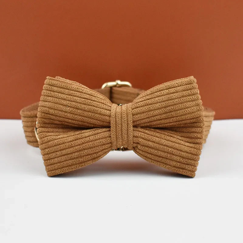 Caramel corduroy dog collar with bowtie, luxury pet accessory.