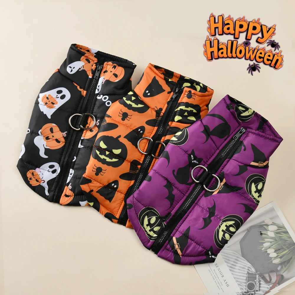 Three Halloween-themed pet coats with pumpkins, ghosts, and cats on a beige background.