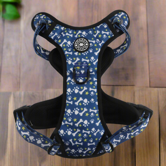 No pull active dog harness with paws and bones design, featuring reflective stitching and locking buckles.