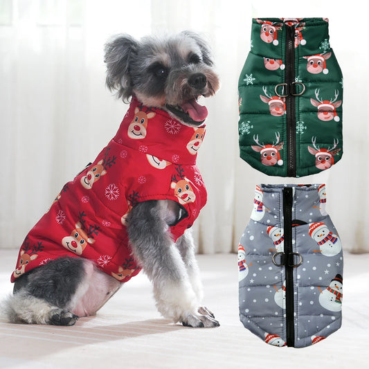 Dog wearing a red puffer coat with reindeer pattern, next to green, gray, and red puffer coats with festive designs.