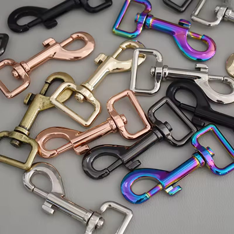 Handmade leather engraved pet accessories with various hardware options.