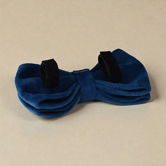 Blue bow on a beige background