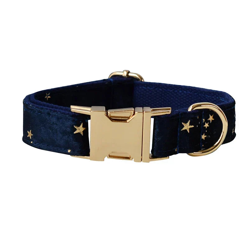 Blue velvet dog collar with starry pattern, engravable for personalisation, featuring gold hardware and quick-release mechanism.