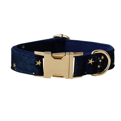 Blue velvet dog collar with starry pattern, engravable for personalisation, featuring gold hardware and quick-release mechanism.