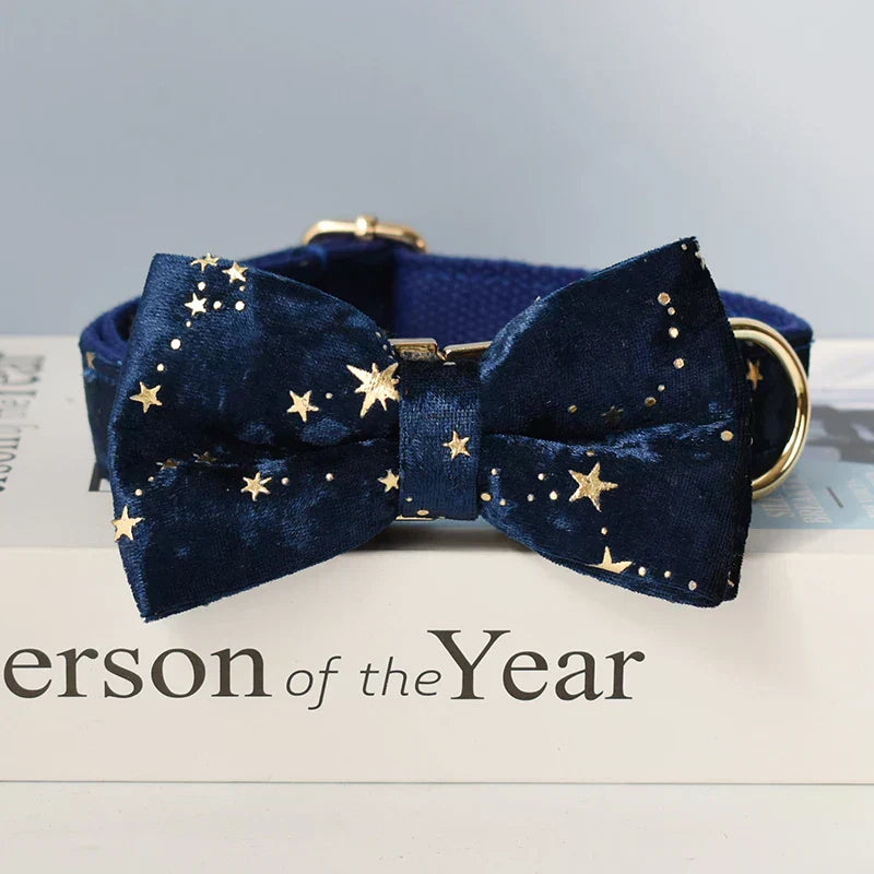 Blue personalised dog collar with starry night pattern and detachable bow tie.