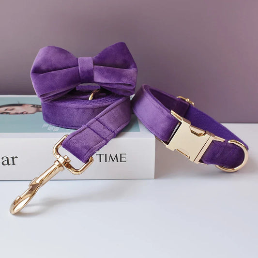 Purple handmade velvet dog collar and lead set with engravable options and a detachable bow tie.
