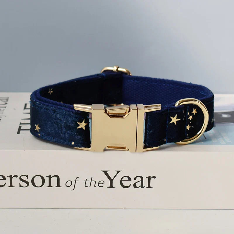 Luxury blue velvet personalised dog collar with starry pattern, quick release, and engravable details.