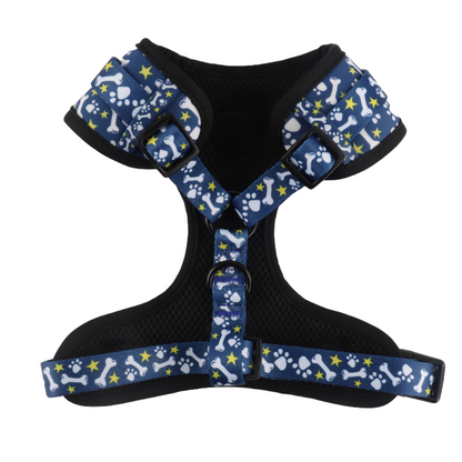 Padded slip-on dog harness with blue bone pattern, featuring adjustable straps and neoprene lining for comfort.
