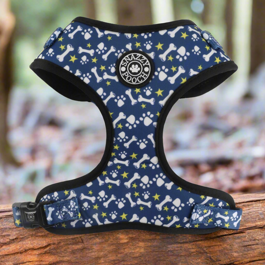 Padded slip-on harness with blue bones pattern for dogs.