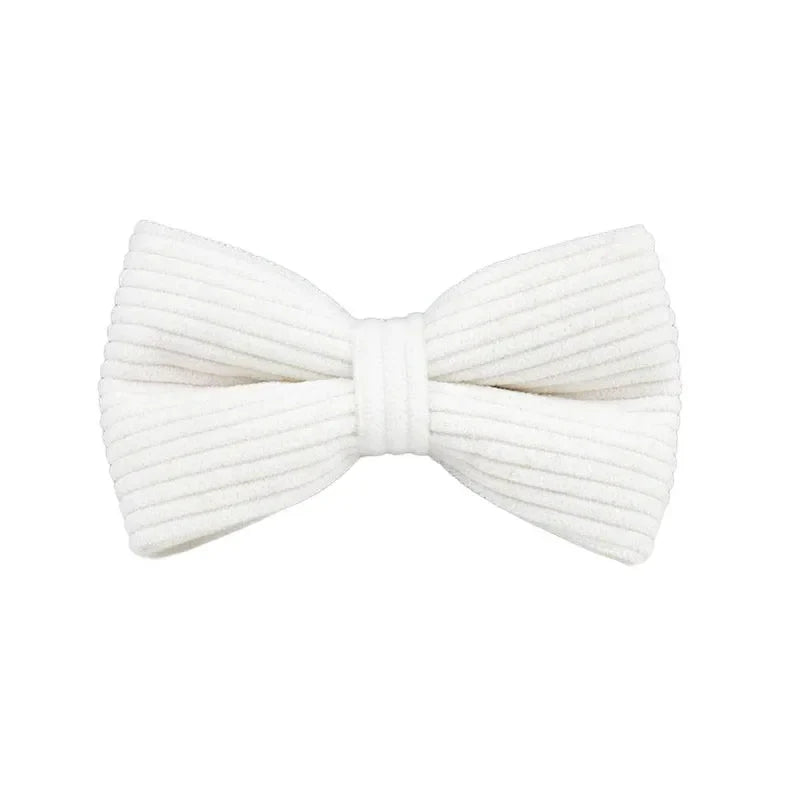 White corduroy dog bowtie accessory for luxury pet collection.