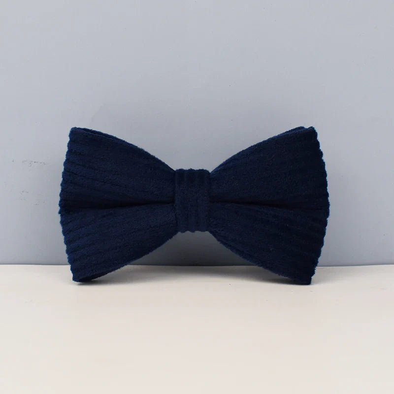 Midnight blue handmade corduroy bowtie for pets, luxury fabric accessory.