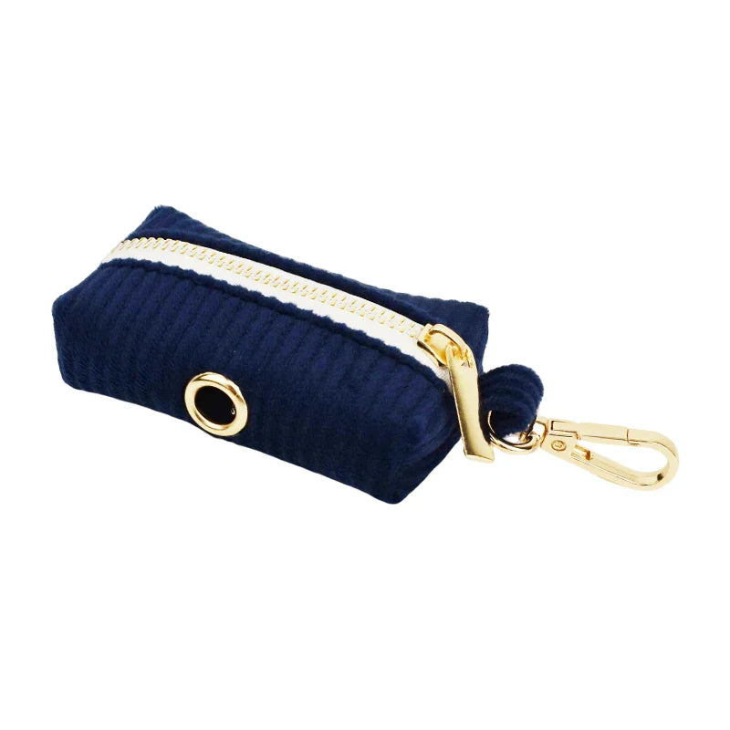 Midnight blue handmade corduroy fabric pet accessory with gold hardware.
