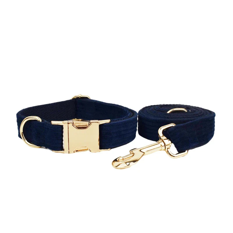 Handmade corduroy fabric dog collar and lead set in midnight blue with gold hardware.