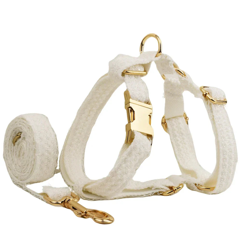 White lace dog harness set with gold-tone hardware, featuring matching lead, ideal for wedding celebrations.