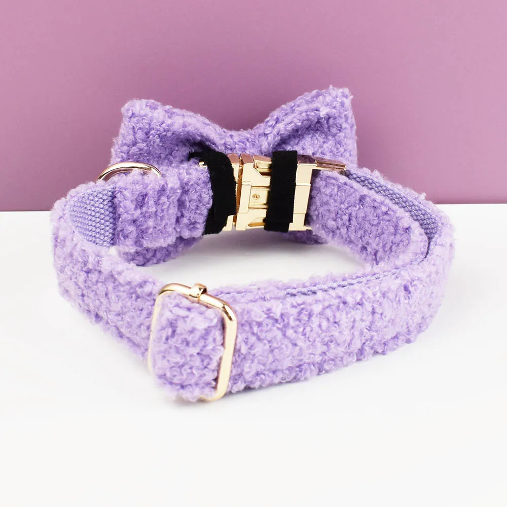 Luxury handmade lilac teddy fabric dog collar with bowtie and gold hardware.