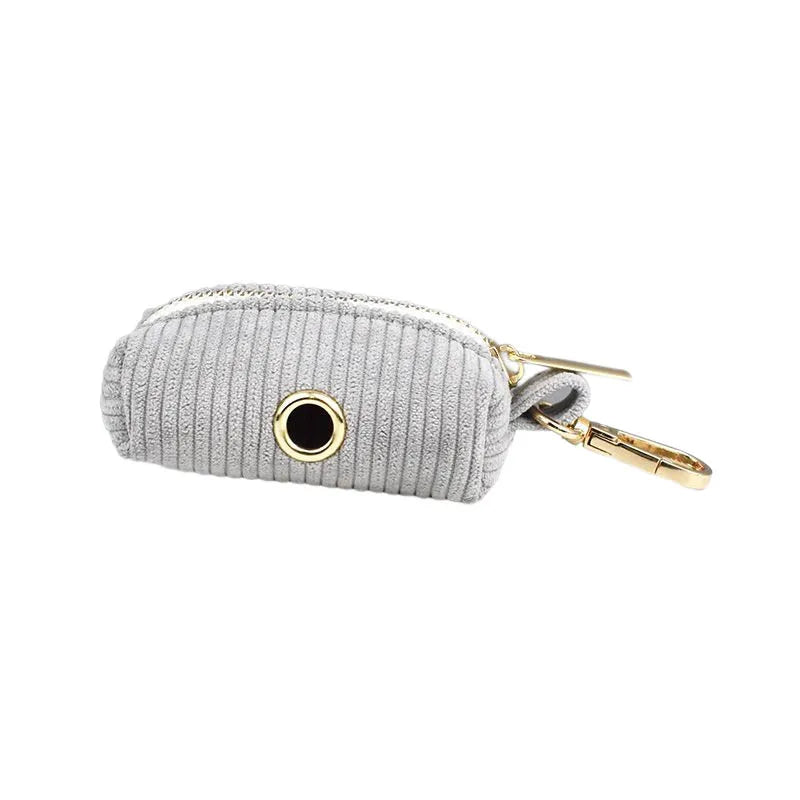 Light grey corduroy pet accessory with gold hardware, luxury handmade design.