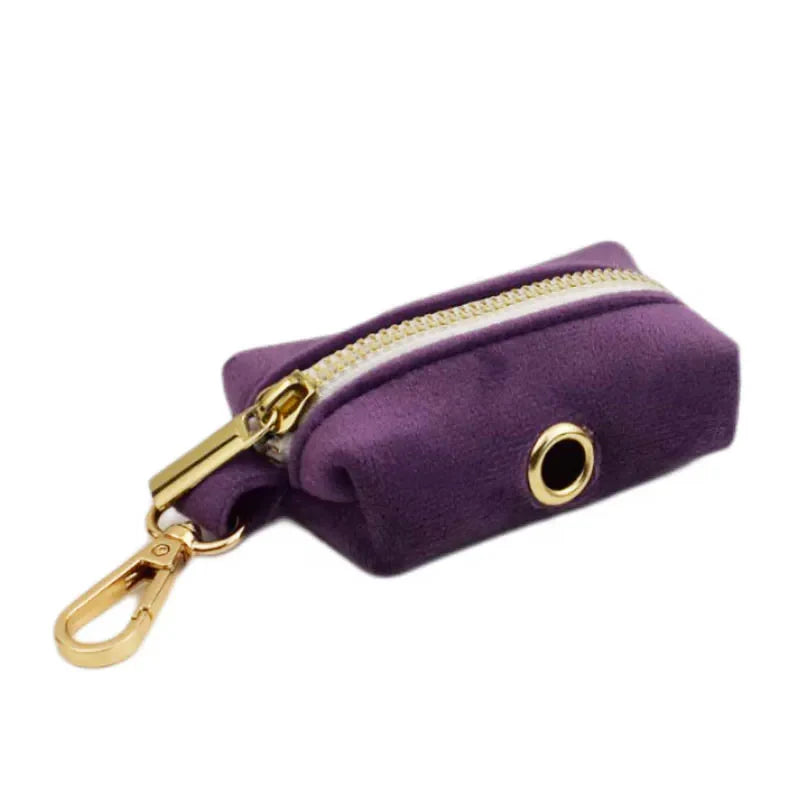 Luxury purple velvet pet accessories with engravable gold details and quick release feature.
