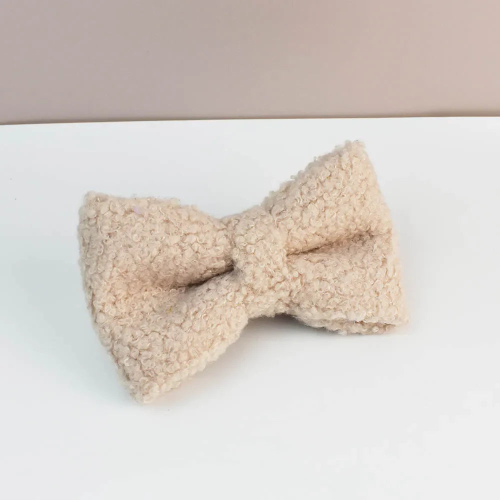 Beige handmade teddy fabric bowtie for luxury pet accessories.
