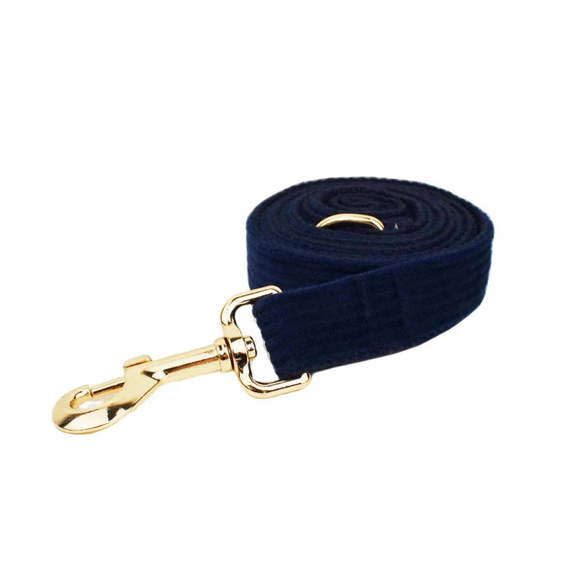 Midnight blue handmade corduroy fabric dog leash with gold hardware.
