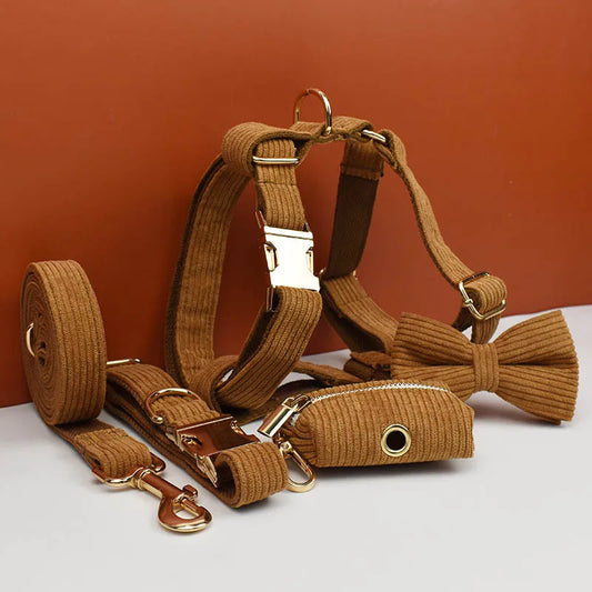 Luxurious caramel corduroy dog accessories set with harness, collar, lead, and bowtie.