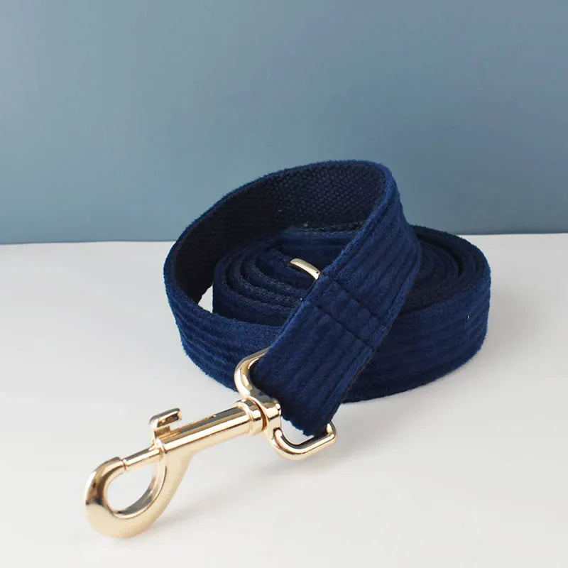 Luxury handmade corduroy dog leash in midnight blue with gold hardware.