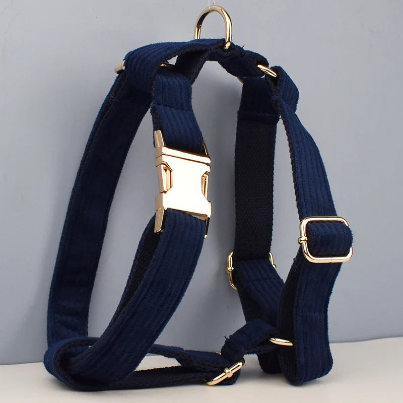 Luxury midnight blue handmade corduroy dog harness with adjustable straps and gold hardware.