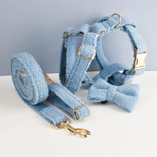 Luxury handmade teddy fabric pet accessories in pastel blue with engravable options and gold hardware.