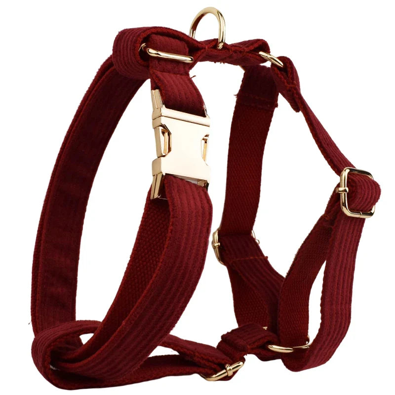 Luxury handmade red corduroy fabric pet harness with gold hardware.