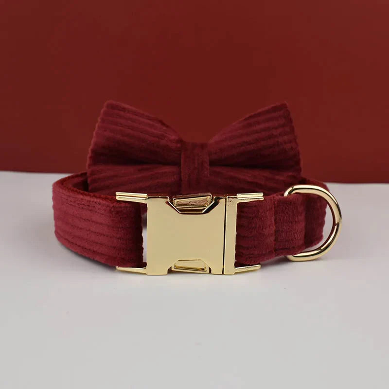 Luxurious red handmade corduroy dog collar with detachable bowtie and gold hardware.