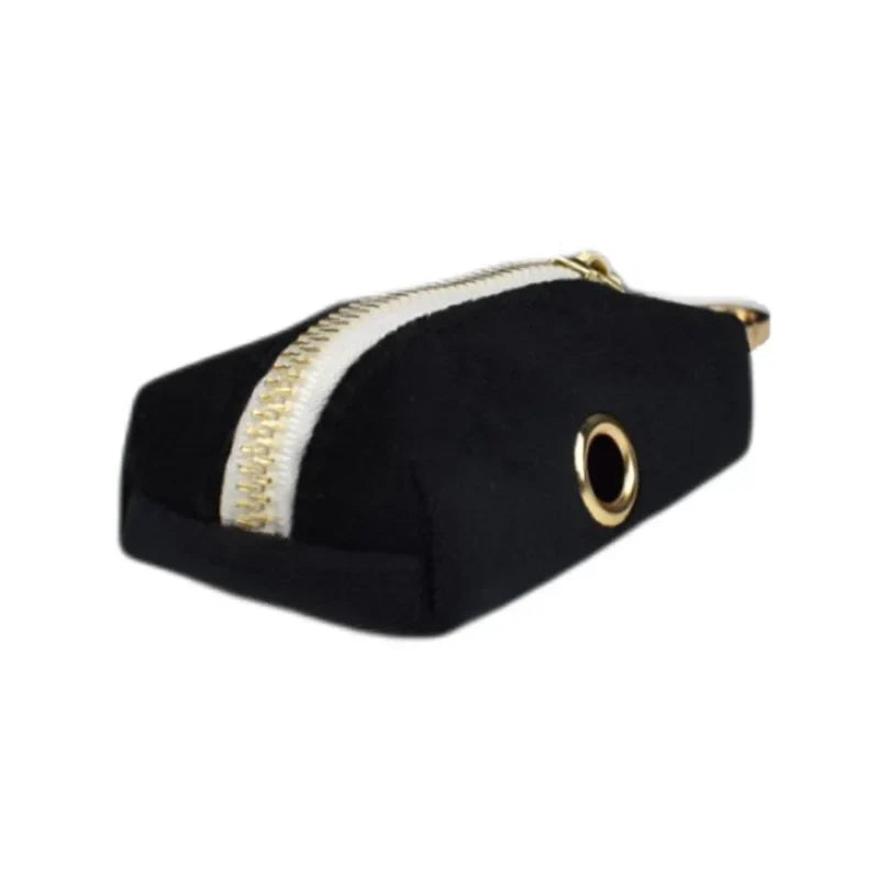 Black velvet dog harness accessory with gold zipper, part of the "Wedding Tails" collection.