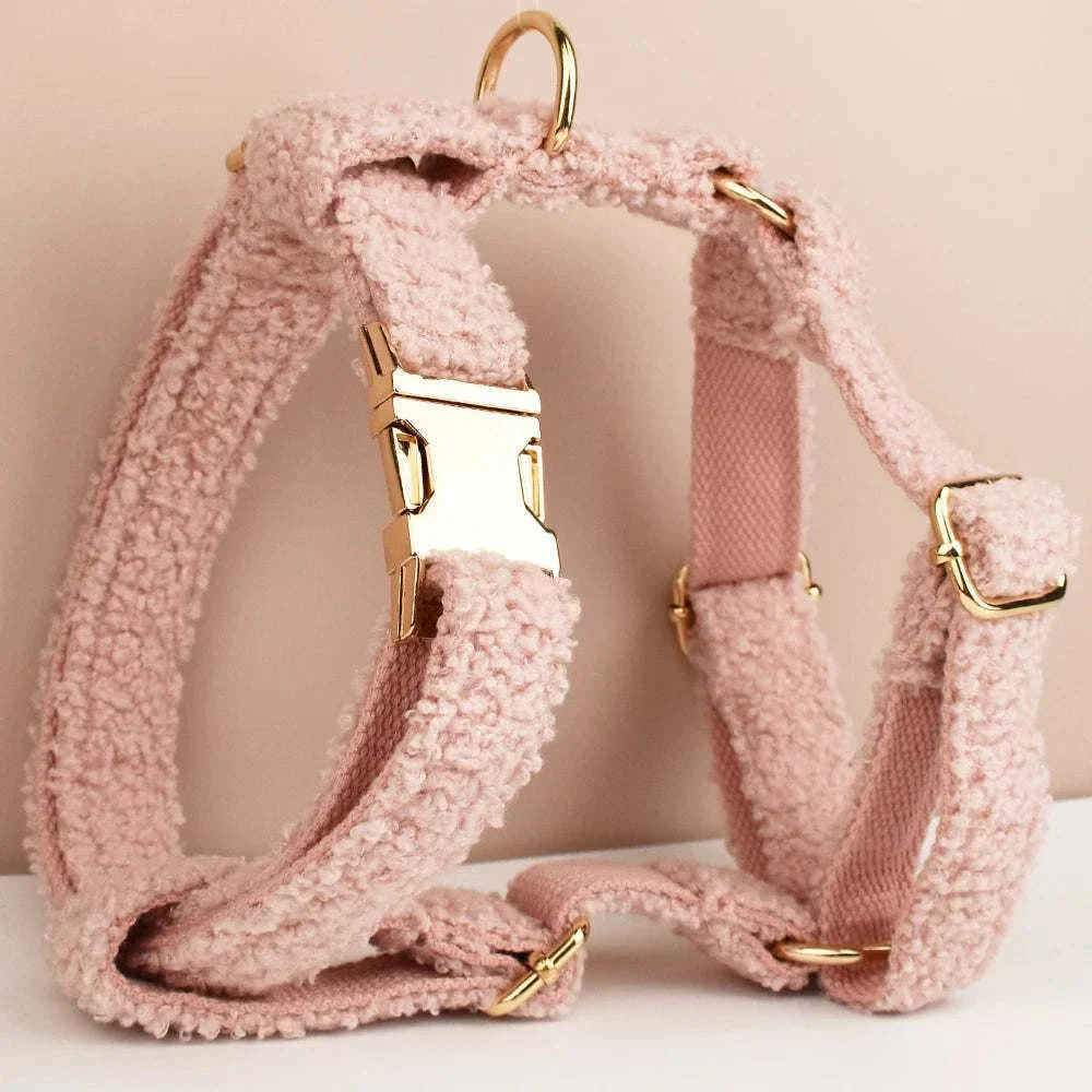 Handmade pink teddy fabric dog harness with gold hardware, customizable and engravable pet accessory.