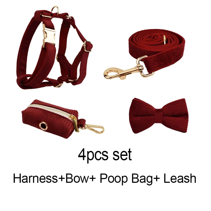 Handmade red corduroy pet accessory set including harness, bow, poop bag, and leash with engravable options.