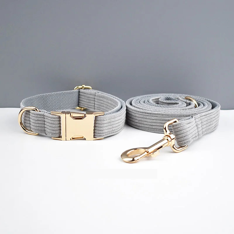 Light grey corduroy pet collar and leash with gold metal hardware for luxury accessories.