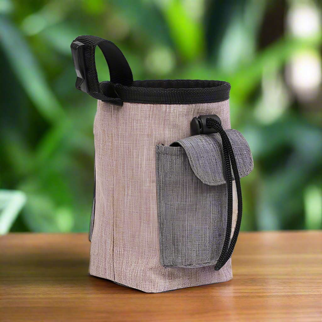Versatile Treat Pouch for dog training with spacious compartments, drawstring closure, and adjustable strap.