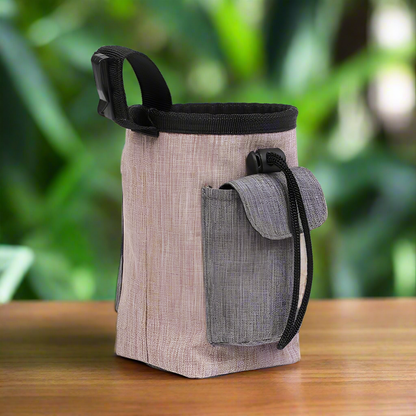 Versatile Treat Pouch for dog training with spacious compartments, drawstring closure, and adjustable strap.