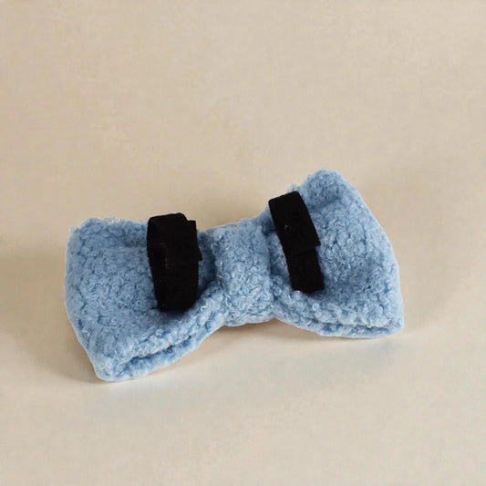 Blue bow tie showing rear velcro loops