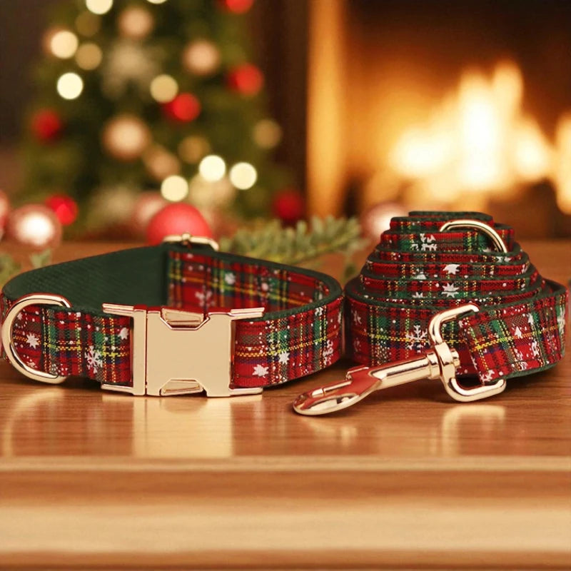 Plaid dog collar and lead set on a wooden surface with a festive background