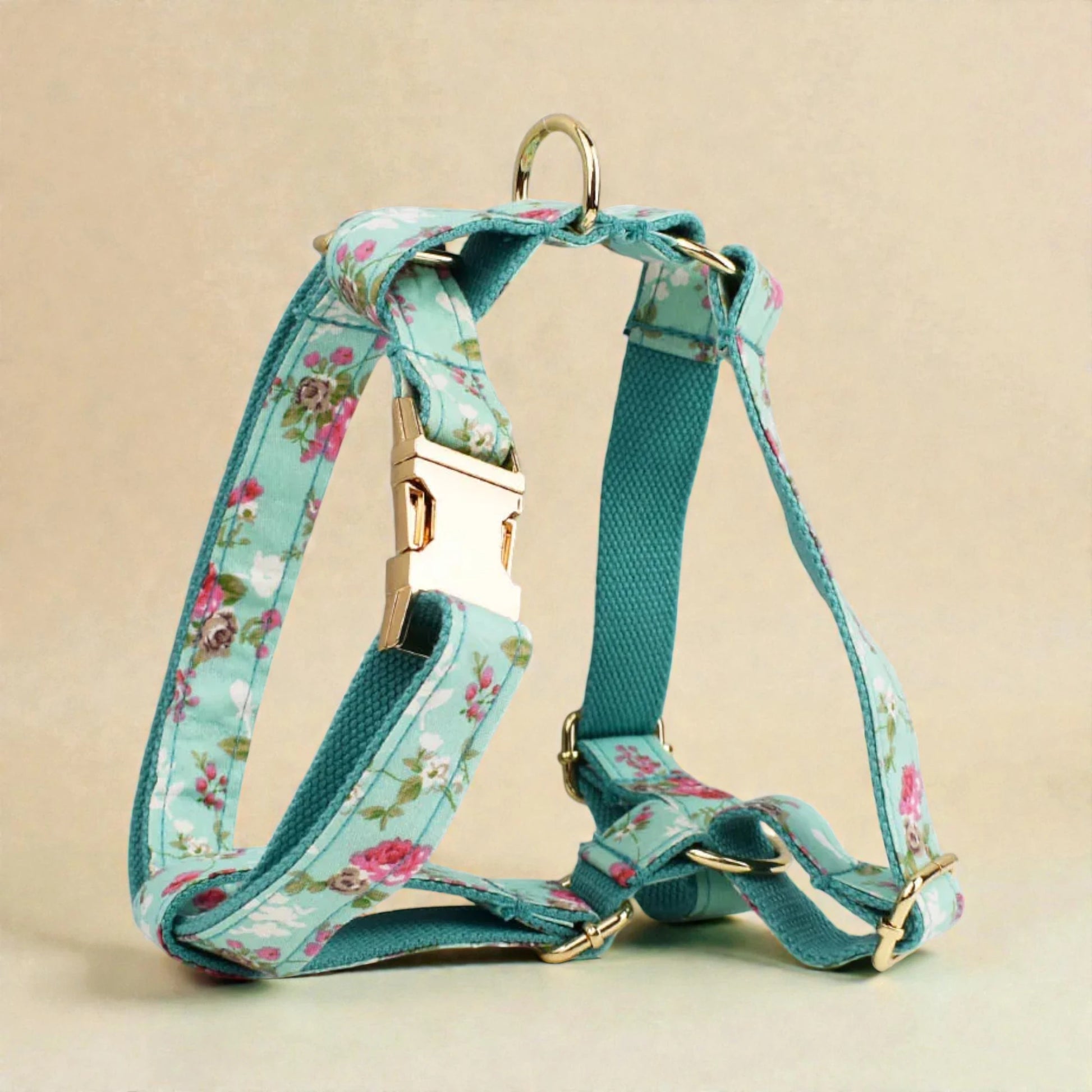 Floral-patterned dog harness on a beige background