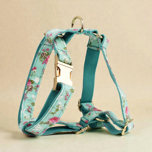 Floral-patterned dog harness on a beige background