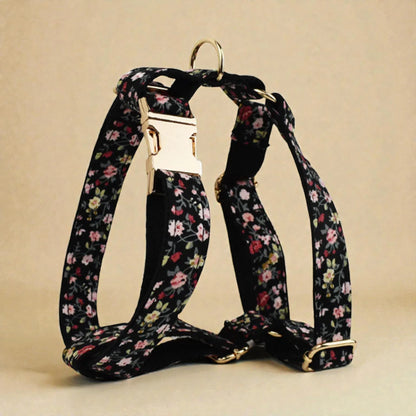 Floral-patterned dog harness on a beige background