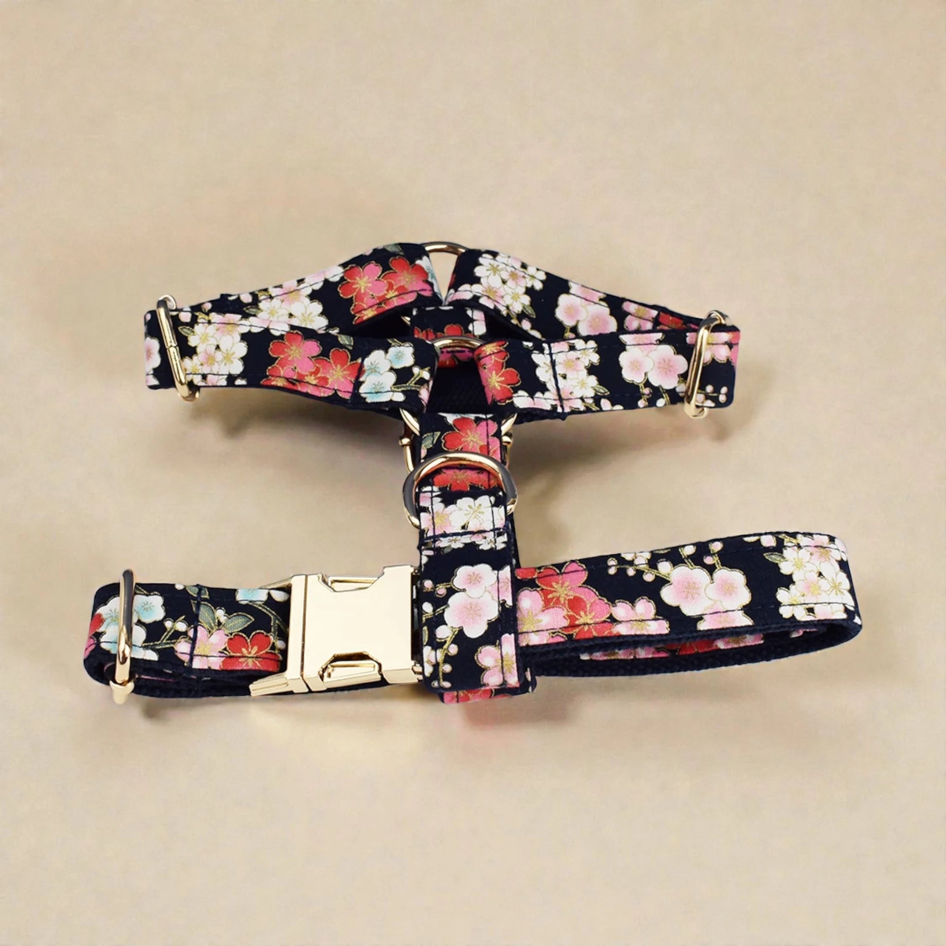 Floral patterned dog harness on a beige background