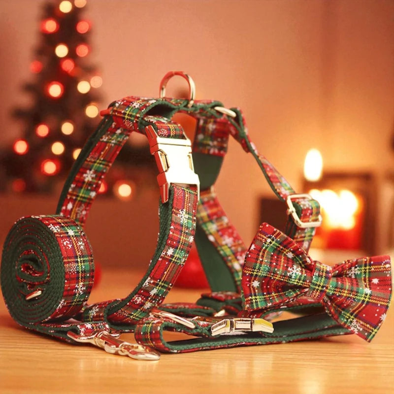 Plaid dog harness and lead set with a Christmas tree and candles in the background