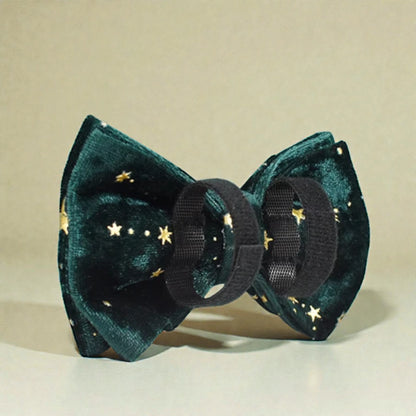 Green velvet bow with star pattern on a beige background
