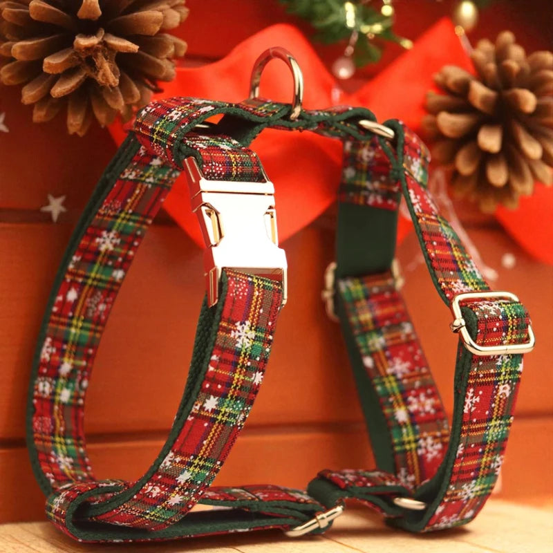 Plaid dog harness with Christmas-themed design on a red background