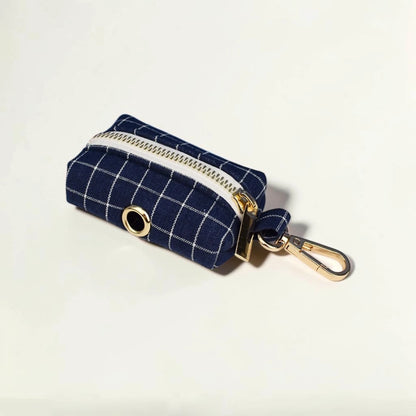 Navy check dog poop bag holder with gold zip and clip